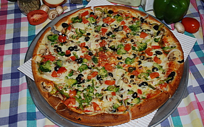 specialty pizza at alton village pizza in alton nh